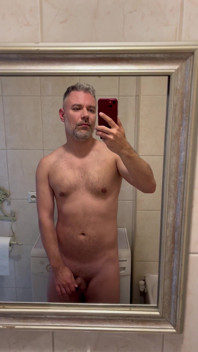 Morning Stretching in Front of a Mirror