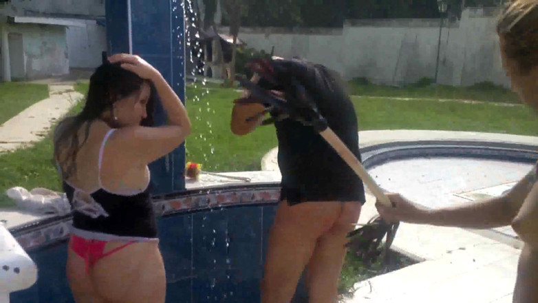 Femdom Austria: She whips their asses outside