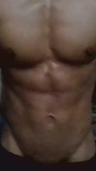 Showing His Abs and Core Area