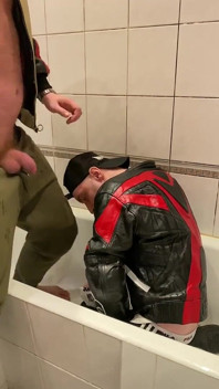 Big Man in Leather Jacket Pissing on Leather Moto Biker