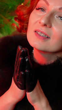 Sexy pin up Arya doing ASMR sounds with short leather gloves