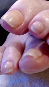 Long Natural Toenails Oiled Feet