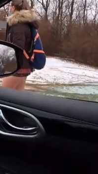 Teen Girl in Plaid Skirt Gets a Ride to School From a Stranger on a Snowy Day