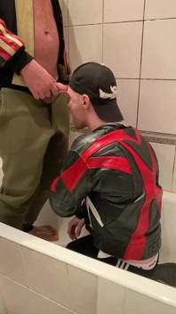 Big Man in Leather Jacket Pissing on Leather Moto Biker