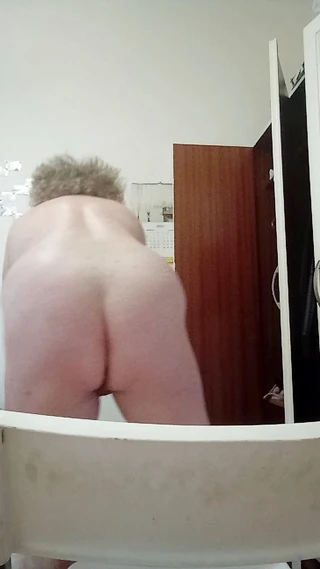 Mature woman playing with herself alone
