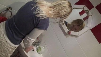 Femdom Austria: Blonde bitch pissing at home