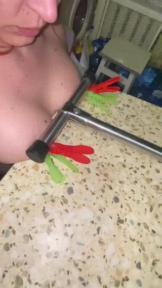 Elena917: tits with clamps and pressing - solo