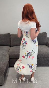 A Redhead in a Dress
