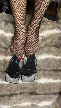 Fishnet in Open Toe Shoes with Red Nail Polish