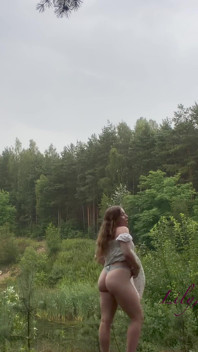 Teen Shows Tits and Asshole During a Storm in the Forest