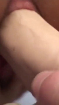 Blonde MILF masturbates with a  dick but he gives it a diddle