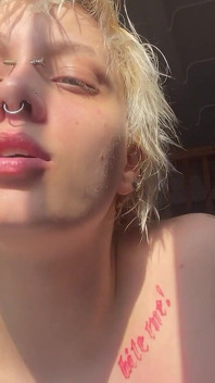 No Makeup Goth Girl in the Sun Flares Piggy Nose