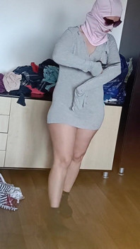 Amateur Woman Has Fun Trying on Clothes and Cutting Them