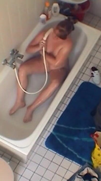 Sexy chubby amateur fucks herself in the bathroom