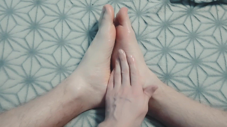 Pasha: Guy Gently Massages His Feet with Oil