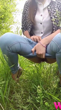 Full Bladder Skinny Brunette Pissing in the Woods in the Tall Grass