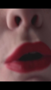 A Girl Is Messing with a Macro Camera