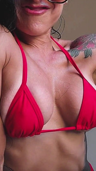 Godaan otot yang disamak matahari