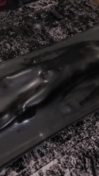 Cute twink tormented in latex vacbed