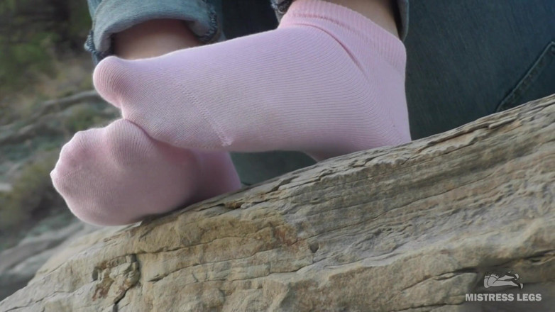 Mistress Legs: Sexy feet in pink ankle socks on the seashore