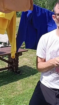 Jerking off While Hanging Out the Laundry