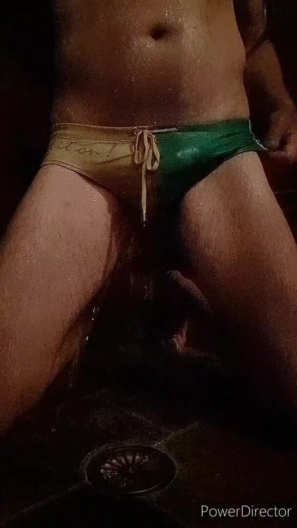 Madaussiehere: Shower time wet green and yellow speedo