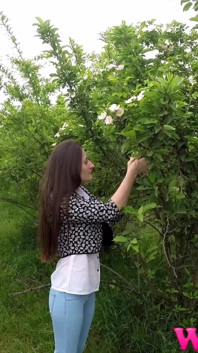 Desperate Girl Full Bladder Trying to Pee in the Forest and Smelling the Flowers