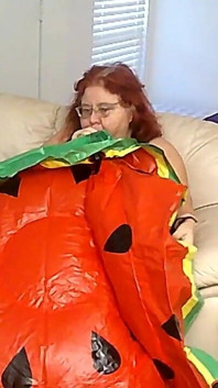 BBW Nurse Vicki Blowing up a Huge Plastic Float That Looks Like a Water Melon Slice