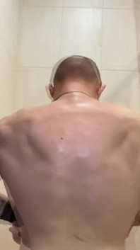 Alpha Shows off His Back Muscles