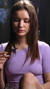 18 Aged Girl Is Smoking Two Strong Cork Cigarettes