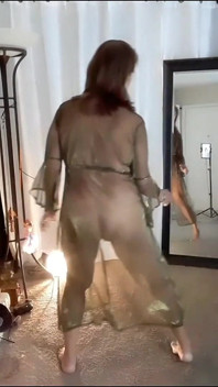 Do You Like Transparent Gowns When a Woman Is Naked with a Hairy Pussy and Dancing?