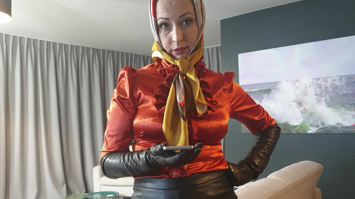 A Lady In Stockings And Silky Headscarf
