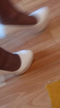 Walking in My High White Shiny Stilettos
