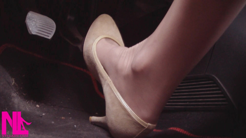Driving Fast in Beige Pumps on Way to Airport (Nyllady)