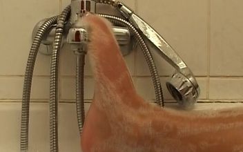 Big Boobed German Slut Enjoys Solo Action in the Shower
