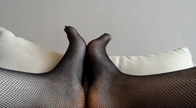 Foot Girls: Lick my feet in black fishnet stockings!