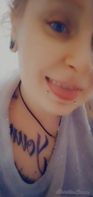 Estrella Steam: Girl with piercings smokes a cigarette
