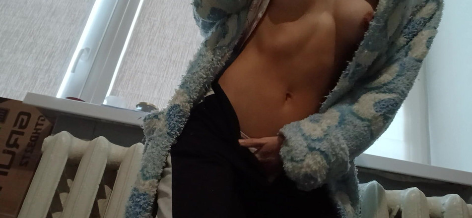 Lesbian-candys: A Slender Brunette in a Robe Masturbates at Home After...