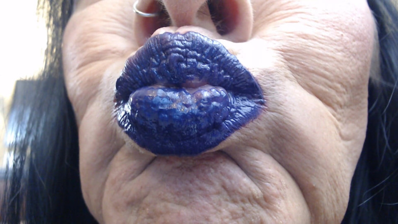 Abby Anna: Blue purple lip wand closeup duck