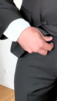 Suited Businessman Jerking off