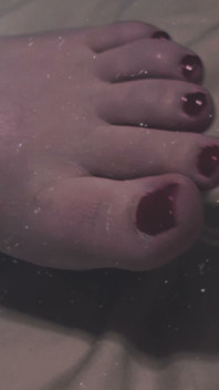 Sexy Red Toes in Bed