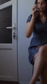 Horny Girl on a Chair Drinks Juice and Play with Herself