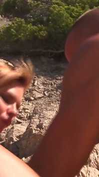 Mature Blonde MILF Pleasures Lover on Rocky Shore