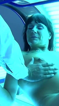 Busty Nadiene Blows Cock in Solarium