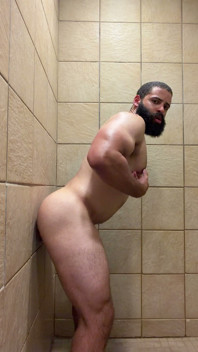 Muscle Cub with Dildo in Gym Showers