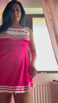 Majorette MILF Teased with Fingers While Bent Over in Tight Dress