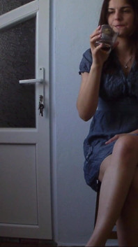 Horny Girl on a Chair Drinks Juice and Play with Herself
