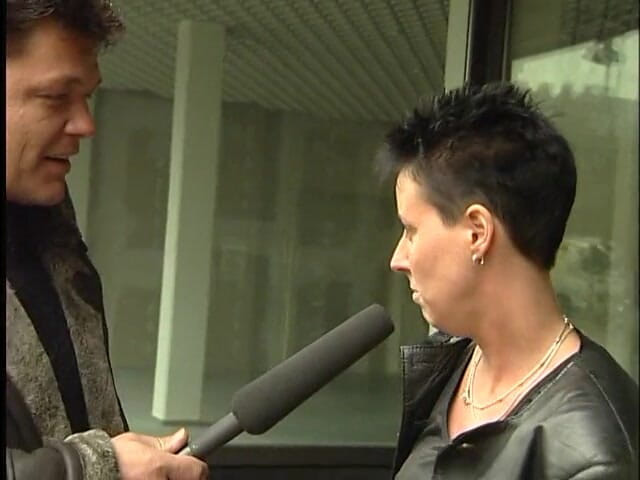 Lucky Cooch: A short-haired German girl was interviewed outdoor.