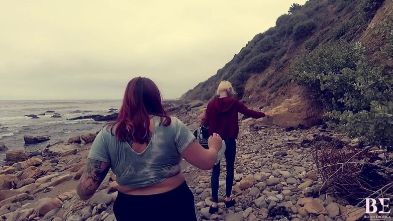 Blush erotica: Lesbians play with vibrator after a day at the beach
