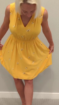 Stella in a Yellow Sun Dress with Black Heels